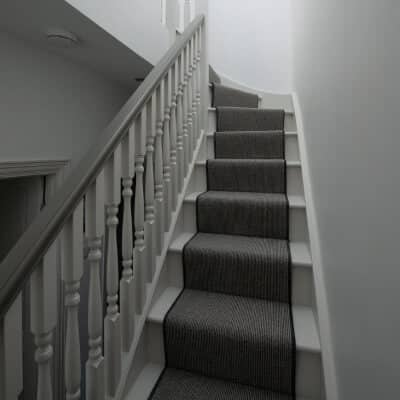 Custom wooden staircase for attic access