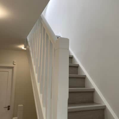 Wooden staircase installed during attic renovation
