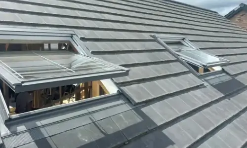 Roofing repairs during attic refurbishment project